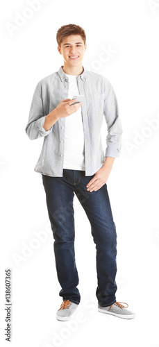 Teenage boy with mobile pho...