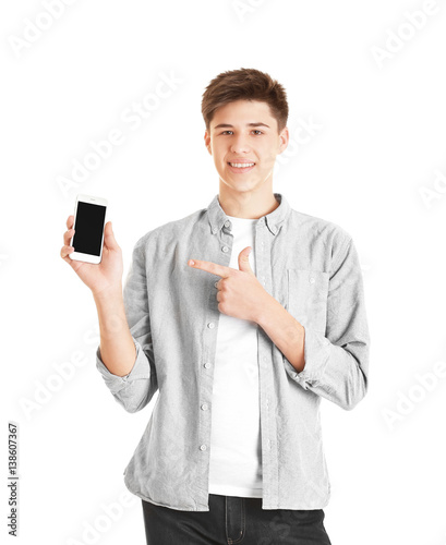 Teenage boy with mobile pho...