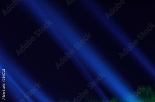 Beam of stage light for live performance on black background