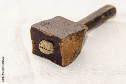 Wooden old hammer. Mallet tool for building construction