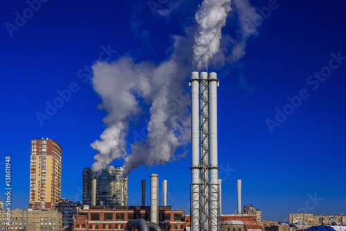 Wallpaper Mural White smoke goes from a pipe on a background of blue cloudless sky Torontodigital.ca