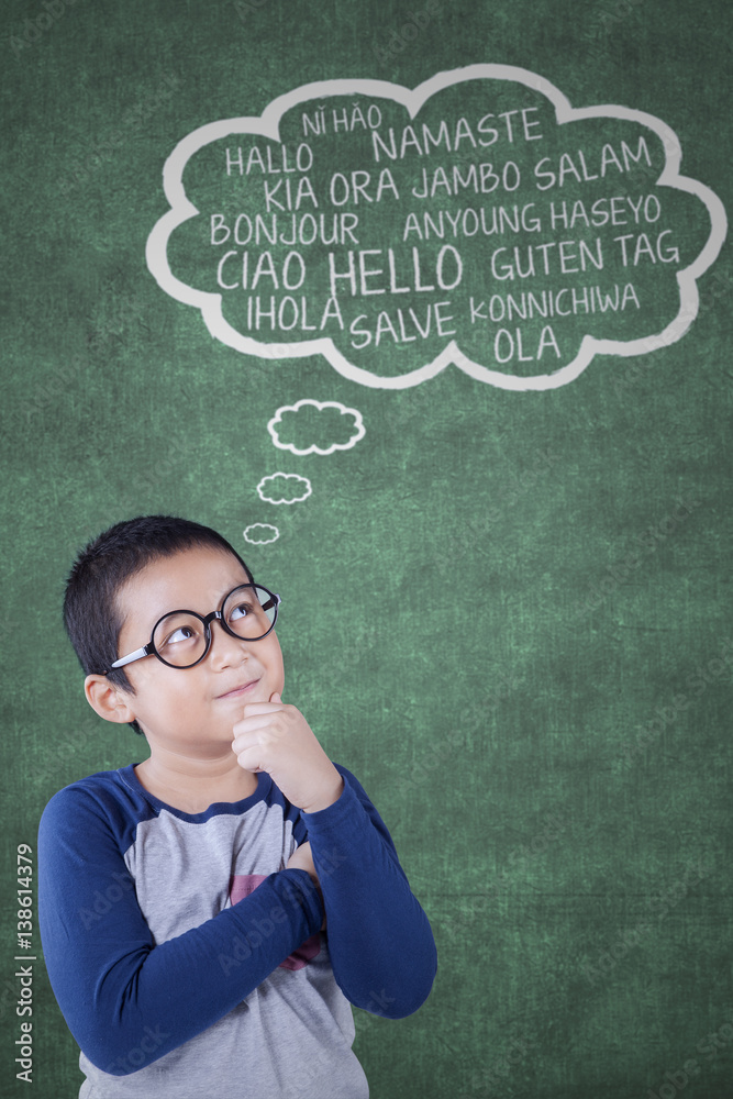 Boy learns foreign vocabulary Stock Photo | Adobe Stock