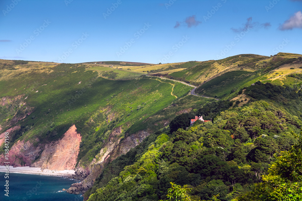 The road and the tourist path along the scenic North Devon. Near the Lynmouth. UK