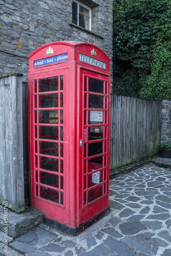 Traditional old English phone booth with the modern technologies. Lynmouth. Devon. UK