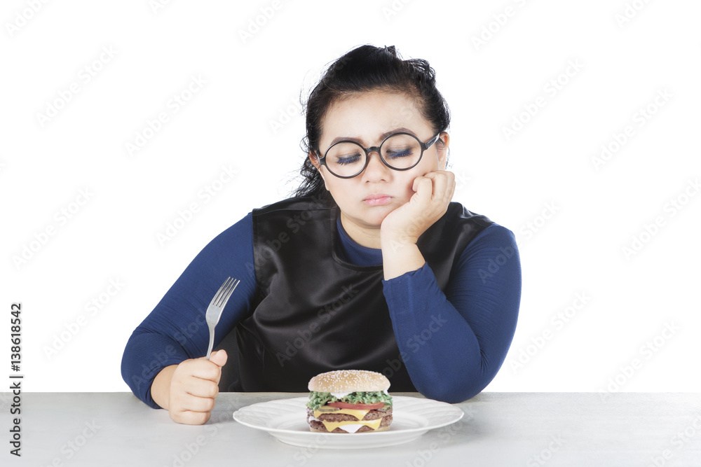 Obese female hesitate eat cheeseburger Obese female hesitate eat cheeseburger