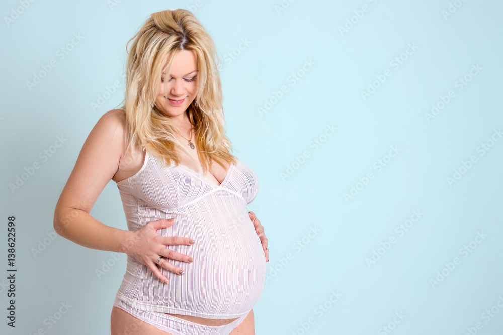 pregnant girl. She hugs her belly. future mom. 37 weeks, 38 weeks, 39 weeks, 40 weeks pregnant girl. She hugs her belly. future mom. 37 weeks, 38 weeks, 39 weeks, 40 weeks