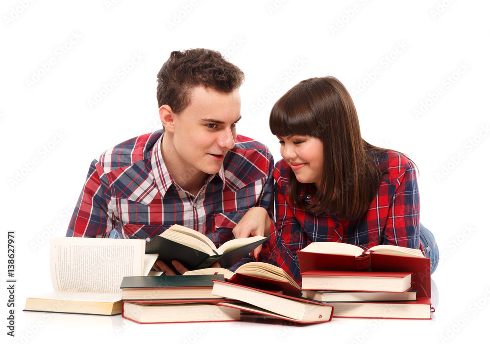Teenage couple studying together Teenage couple studying together