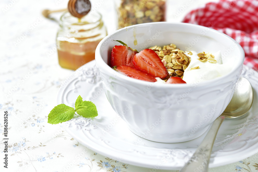 Healthy organic breakfast with granola,yogurt and strawberry. Healthy organic breakfast with granola,yogurt and strawberry.