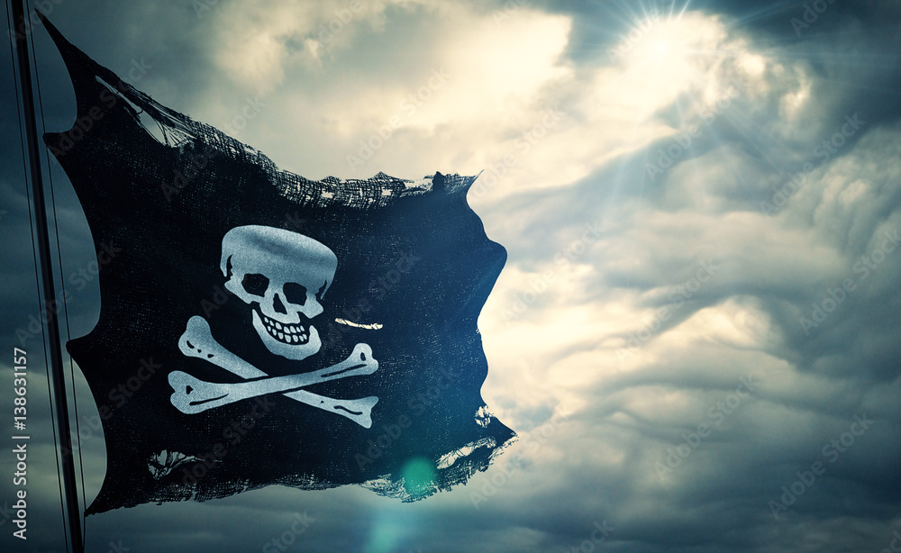 Obraz premium zgrywanie łza grunge stara tkanina tekstura pirackiej flagi czaszki macha na wietrze, perkalowy symbol pirata na pochmurnym niebie z promieniami słońca światło, ciemny styl tajemnicy, haker i złodziej