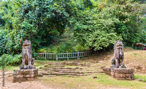 Statues at Phnom Bakheng in Angkor Wat - Cambodia photo