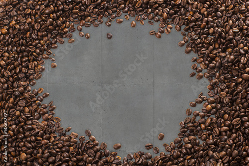 Frame of coffee beans, concrete background
