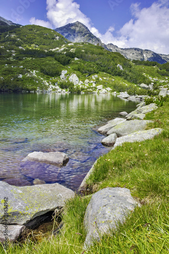 Landscape with Reflection of Muratov peak in river, Pirin Mountain, Bulgaria