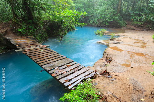 Rio celeste and small wooden bridge photo