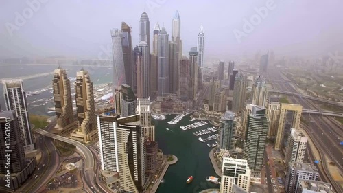 Futuristic aerial view of residential skyscrapers in the Dubai Marina walk. Dubai, United Arab Emirates
