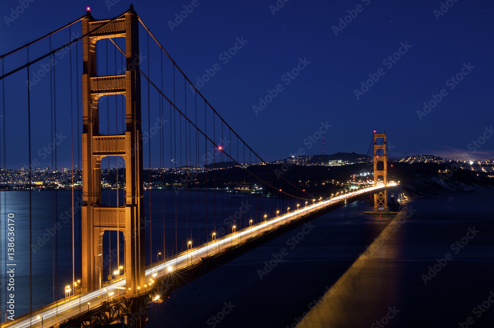 Fototapeta premium SAN FRANCISCO, CA - AUGUST 4, 2009: Golden Gate Bridge shines at night.