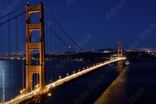 Fototapeta Naklejka Na Ścianę i Meble -  SAN FRANCISCO, CA - AUGUST 4, 2009:  Golden Gate Bridge shines at night.