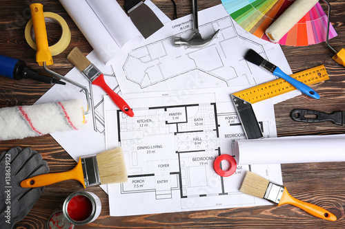 Decorator workplace with house project and tools