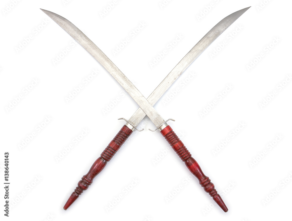 Thai swords isolated on white background.Thai swords isolated.Two Thai swords isolated Thai swords isolated on white background.Thai swords isolated.Two Thai swords isolated
