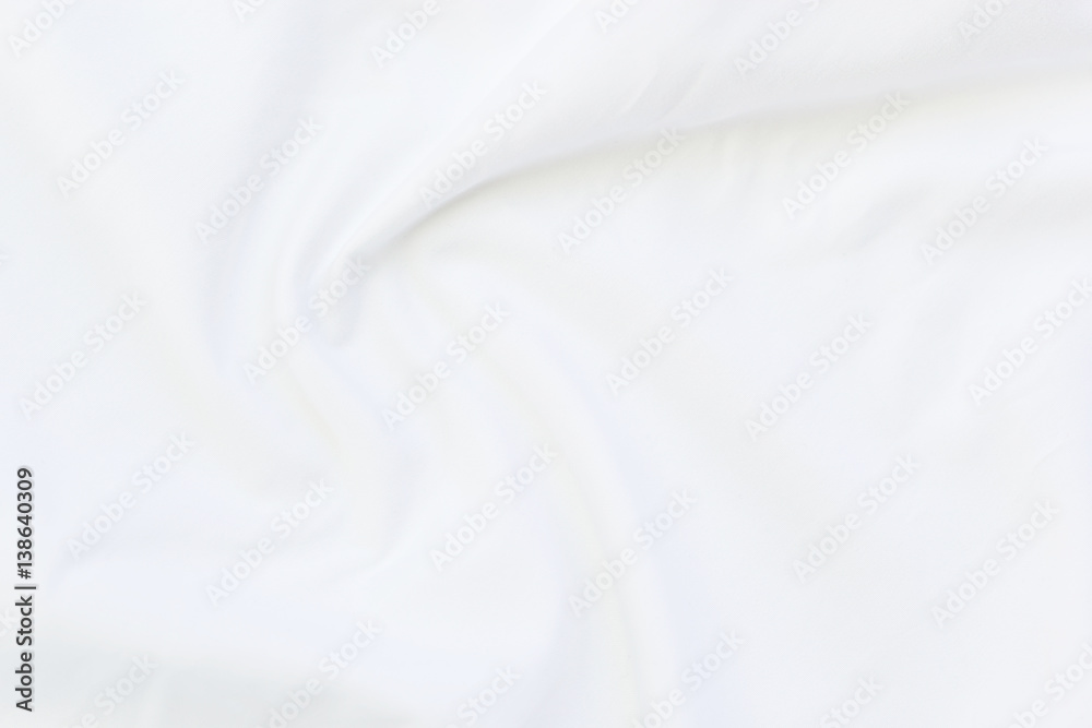 Fototapeta premium Close up of white bedding sheets and copy-space.