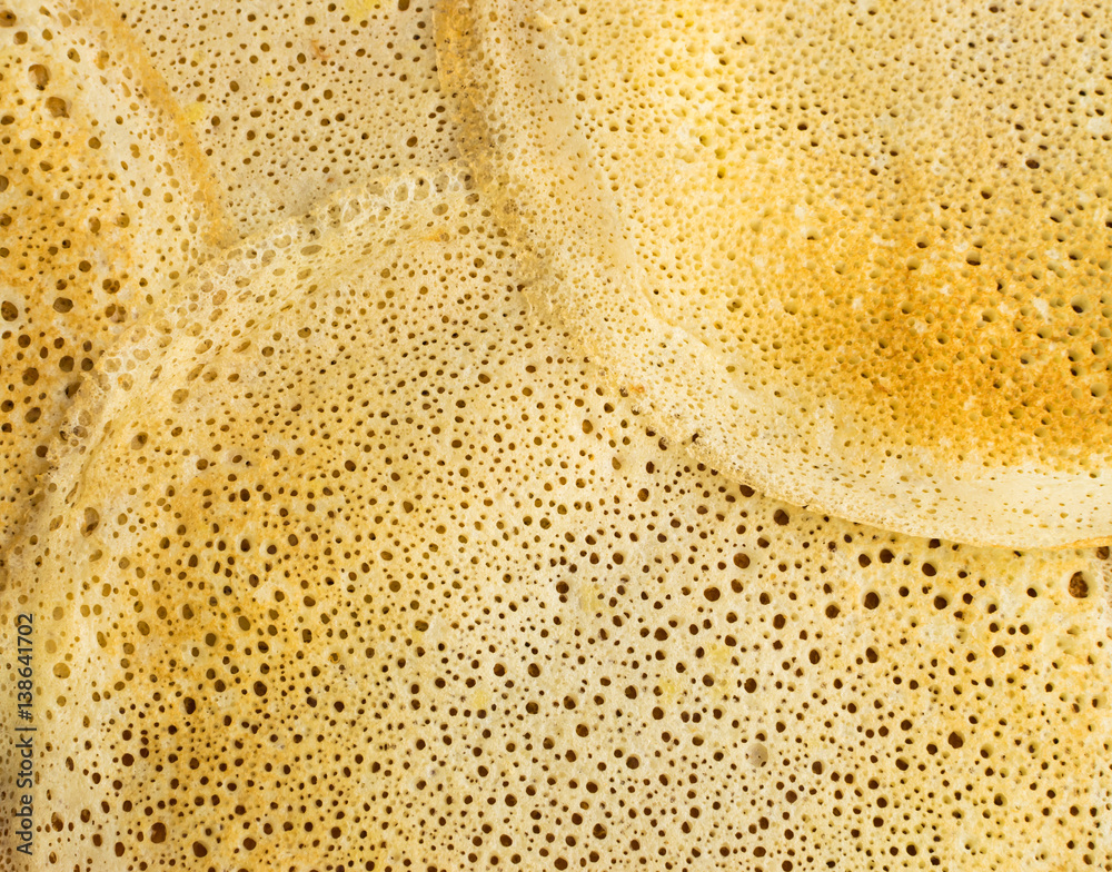 Thin Pancakes on a Wooden Background Top View. Fresh Homemade Crepes Thin Pancakes on a Wooden Background Top View. Fresh Homemade Crepes