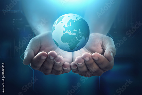 People hand holding floating earth