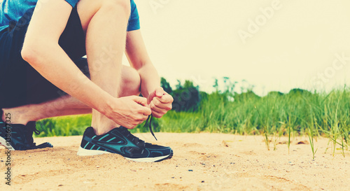 Runner preparing to go for a jog outdoors