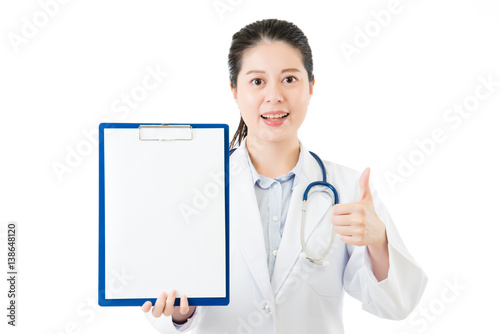 beauty asian doctor thumbs up showing blank clipboard