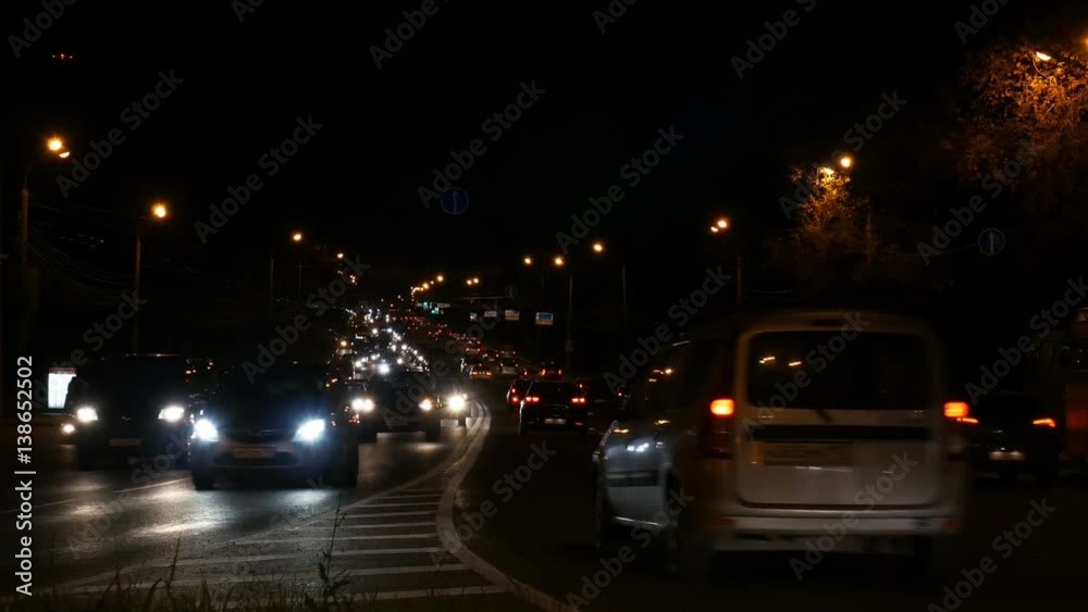 Night highway with traffic jam and emergency car Night highway with traffic jam and emergency car