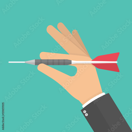 Hand holding dart arrow. Flat design