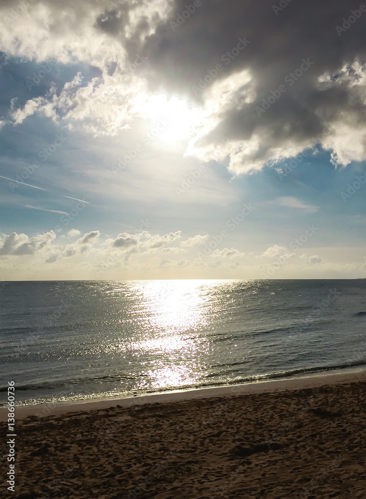 The sun shines through the clouds sea. Mobile photo The sun shines through the clouds sea. Mobile photo