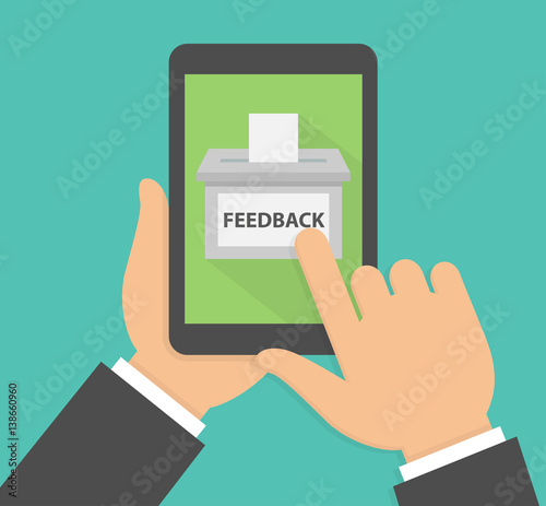 Feedback online concept. Hand holding tablet with feedback box icon on the screen. Hand pointing to a feedback box on a tablet display. Flat design