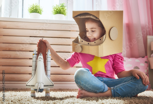 girl in an astronaut costume photo