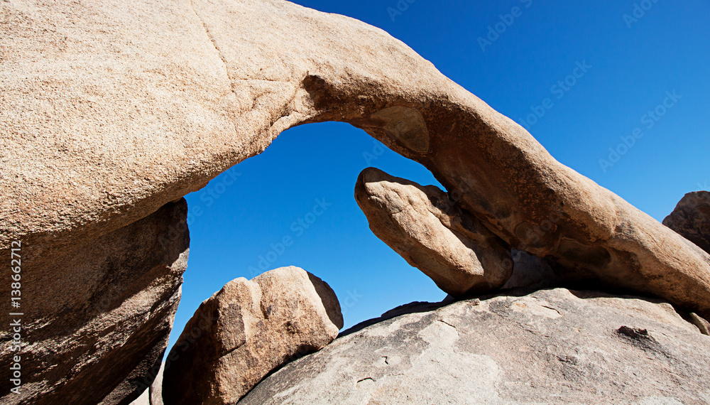 Arch rock formation in Joshua Tree National Park Arch rock formation in Joshua Tree National Park