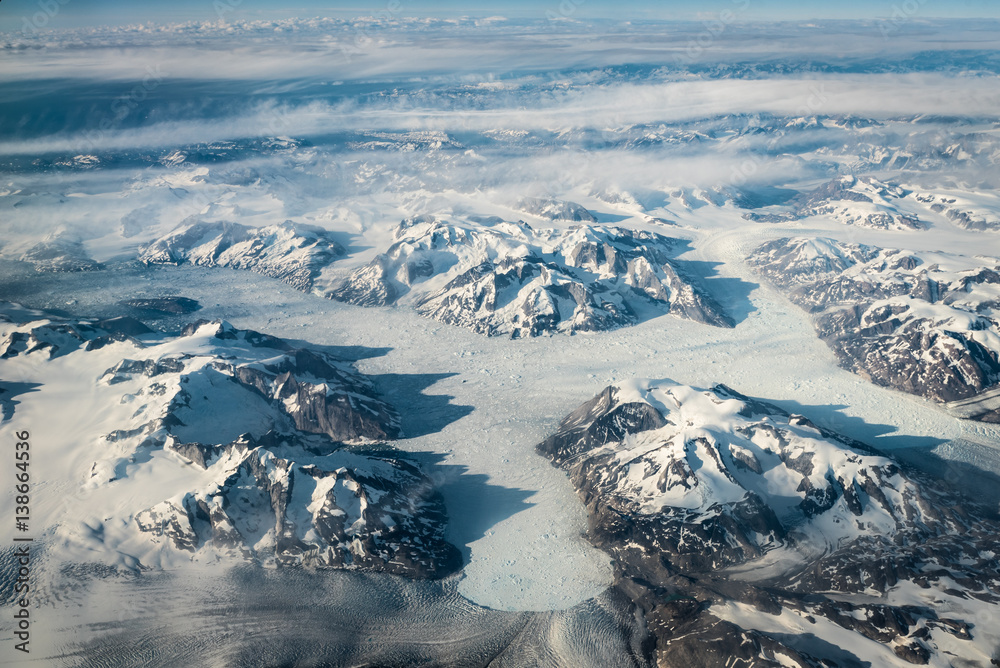 Fototapeta premium Mountains under the plane wings