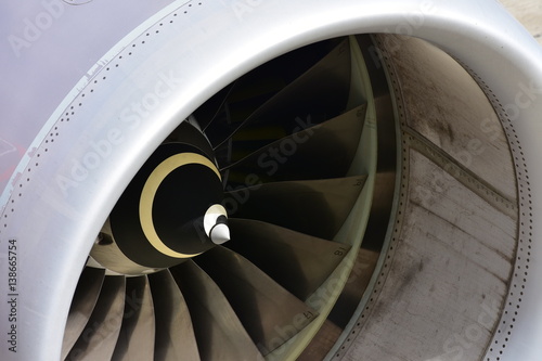 Air entry into airplane turbofan engine showing fan blades.
