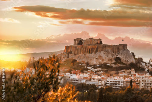 Acropolis with Parthenon temple against sunset in Athens, Greece