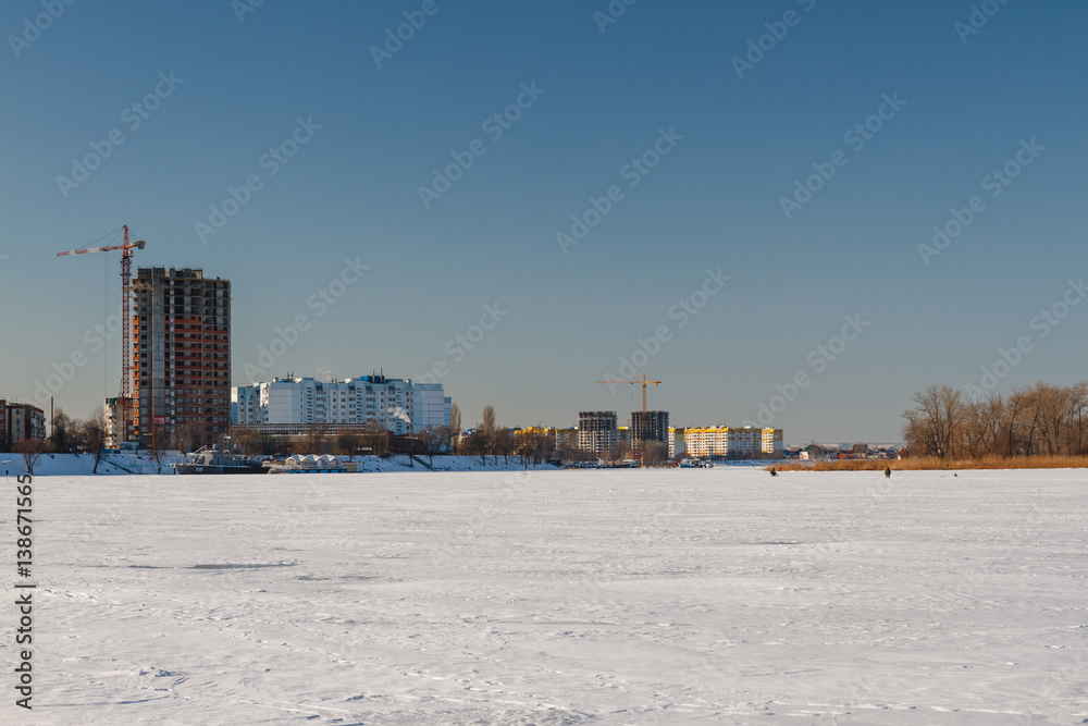 Winter landscape on a frozen river