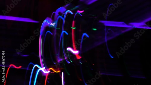 Timelapse of random glowing defocused lights at the party