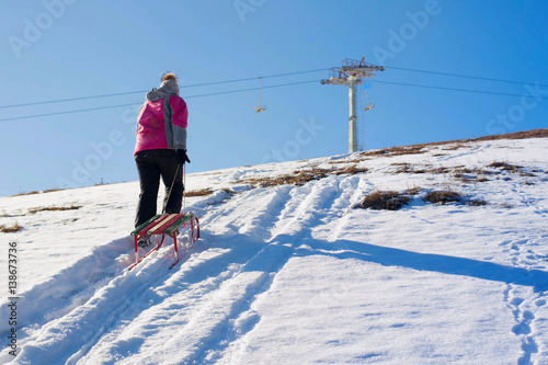 girl with sledge © Roman