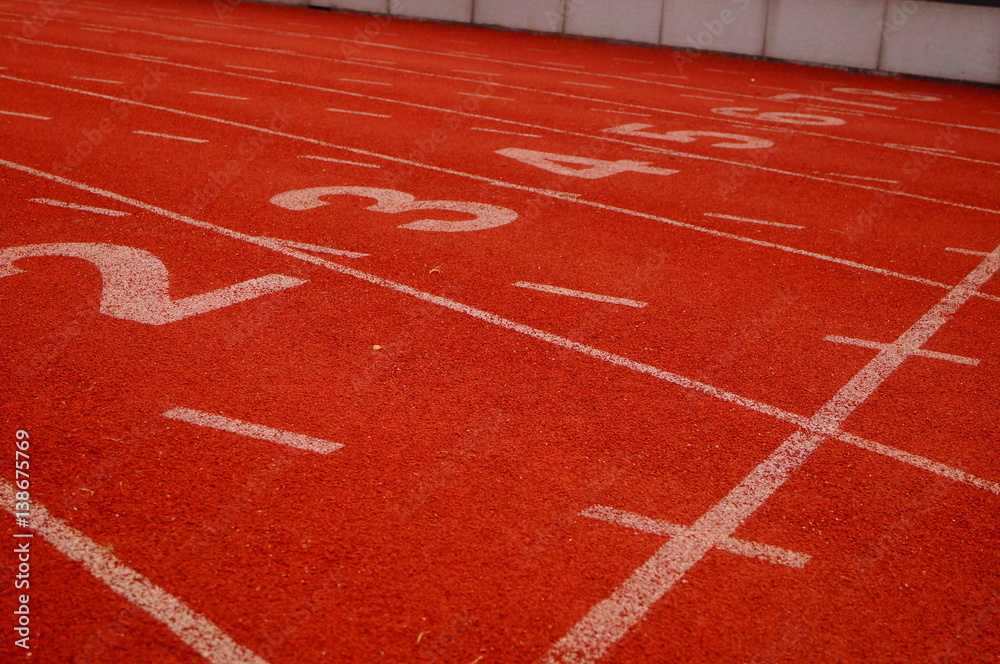 Fototapeta premium Red plastic track and field track