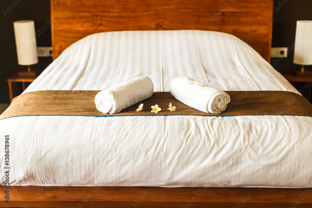 room in villa, towel on the bed