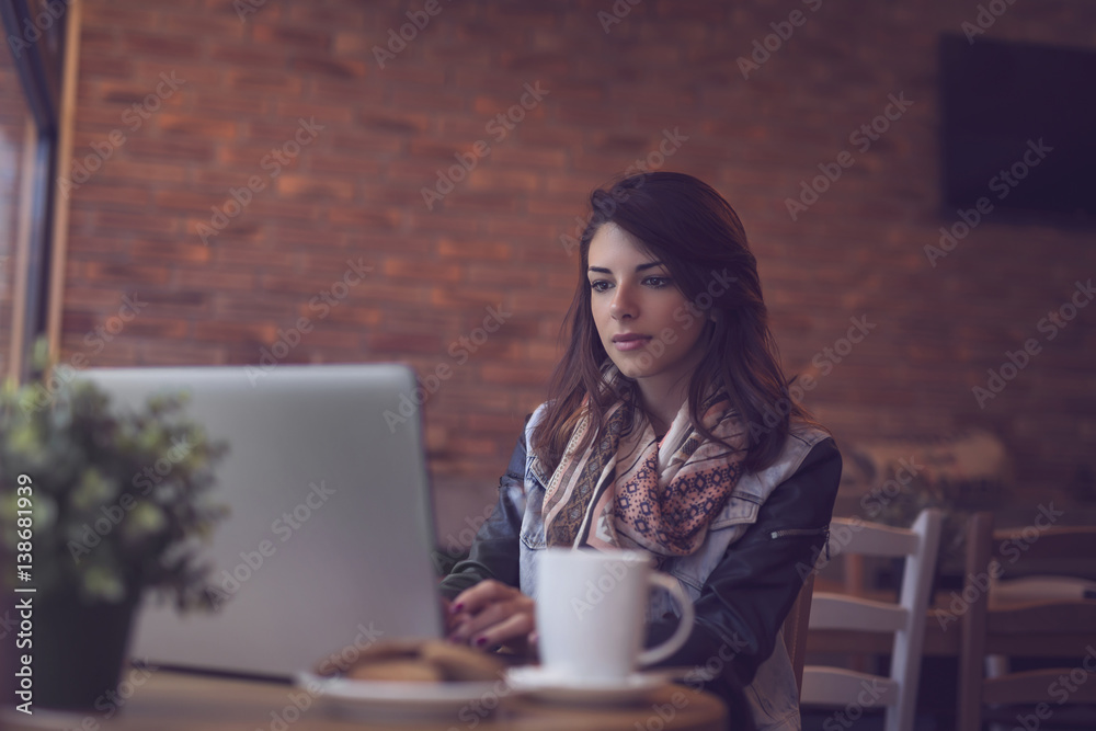 Woman working in a cafe Woman working in a cafe