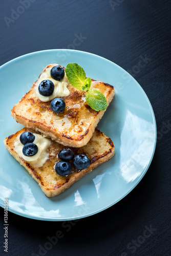  French toasts with fresh blueberries and maple syrup
