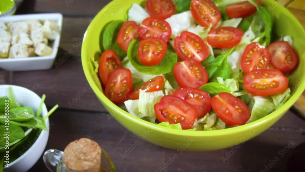 preparing fresh vegetable salad. Slow motion preparing fresh vegetable salad. Slow motion