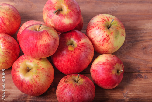 Wallpaper Mural Harvested apples lie on a wooden background. Torontodigital.ca