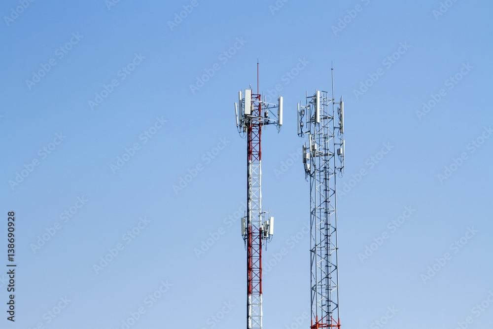 Mobile phone communication tower transmission signal with blue sky background and antenna and twin Mobile phone communication tower transmission signal with blue sky background and antenna and twin
