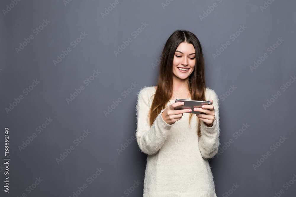 Cheerful young woman talking on mobile phone Cheerful young woman talking on mobile phone
