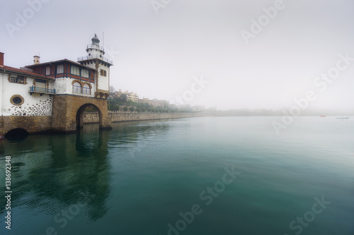 Arriluze lighthouse with fog photo