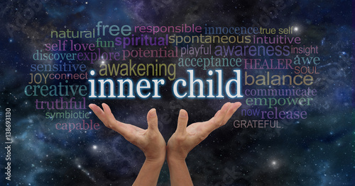 Embrace your Inner Child - female hands stretching up palms open with the words INNER CHILD floating above surrounded by a relevant word cloud on a dark blue starry night sky background
