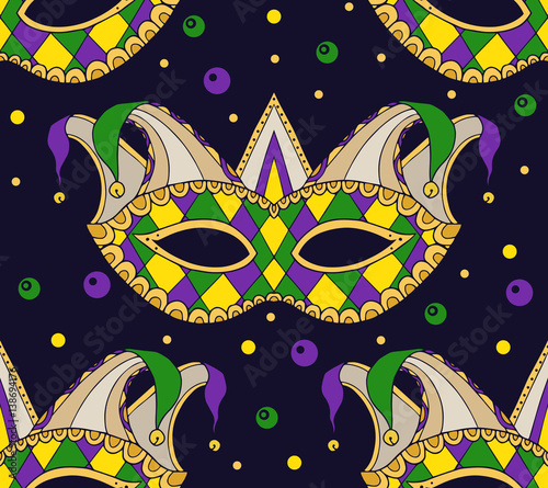 Seamless festive pattern with masks. Vector texture on the Mardi Gras holiday for your creativity